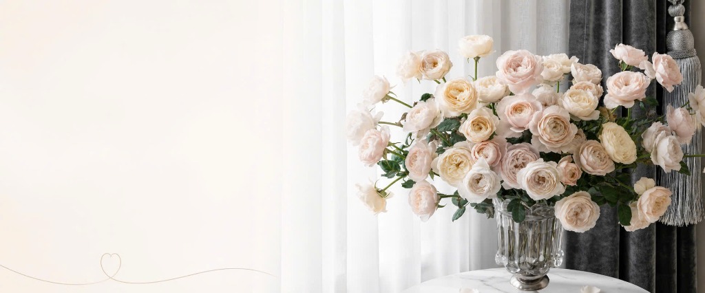 White garden roses on marble table